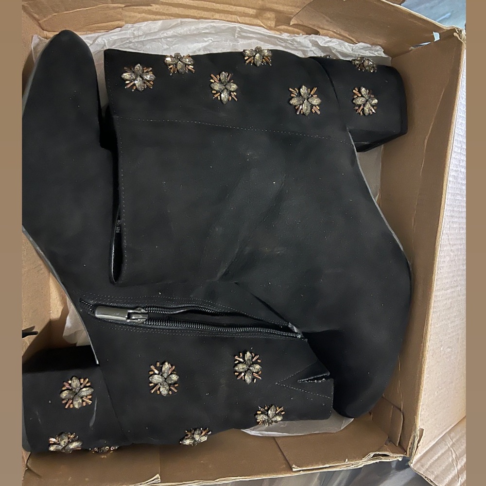 Worn bootie with heel size 12